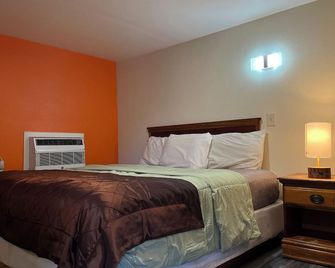 Ponca Motel - אביליין - חדר שינה