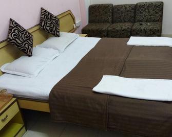 ホテル サバルワル イン - バンガロール - 寝室