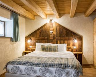 Chambres d'Hotes La Moraine Enchantee - Pila - Bedroom