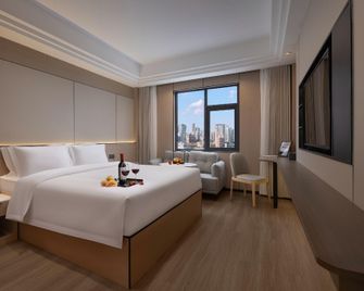 Small Five-Star Hotel (Huiyang High-Speed Railway Station Branch) - Huizhou - Camera da letto