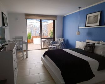 Hotel Boutique Confort Suites - Popayán - Bedroom