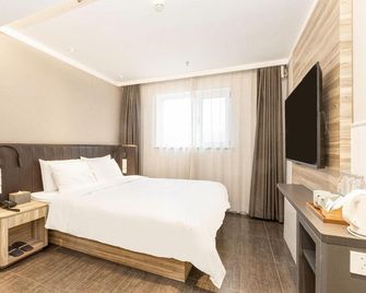 Hanting Premium Hotel (Beijing Tongzhou Universal Resort Hotel) - Beijing - Bedroom