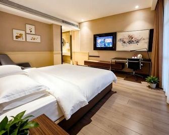 Yishang Hotel (Chibi Yongbangcheng Branch) - Xianning - Bedroom