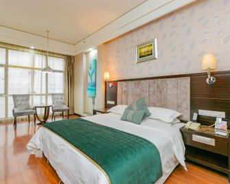 Yiyuan Times Hotel (Qiandong West Station Branch) - Shaoyang - Bedroom