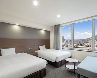 Hotel Oriental Express Kagoshima Tenmonkan - קאגושימה - חדר שינה