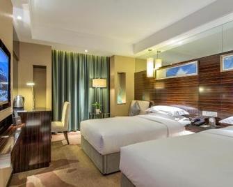 Yatai Longda Hotel - Changchun - Bedroom