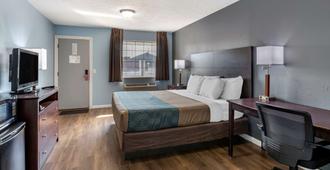 Econo Lodge Inn & Suites South - סנדסקי - חדר שינה