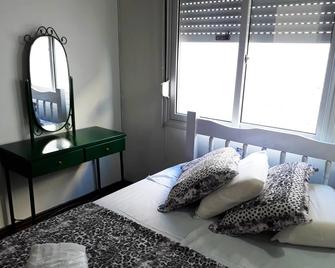 Hotel Rios - Jaguarão - Camera da letto