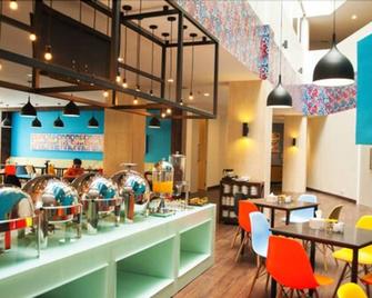 Idoop Hotel by Prasanthi - Kota Mataram - Restoran