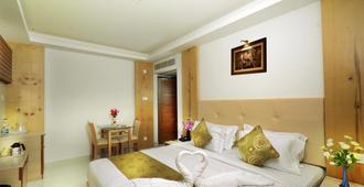 Hotel Mahis Gateway - Coimbatore - Bedroom