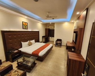 Hotel Taj Inn - Morādābād - Schlafzimmer