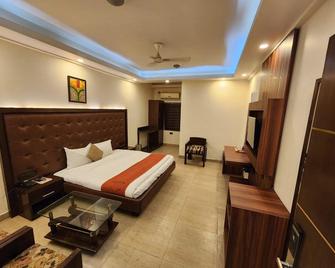 Hotel Taj Inn - Morādābād - Camera da letto