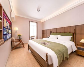 Good Friend Inn (Guilin Maternity and Child Bo'ai Hospital Baoxian Middle School Shop) - Guilin - Bedroom