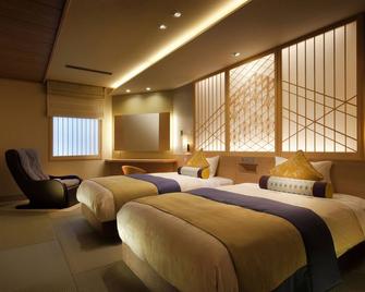 Asaya Hotel - ניקו - חדר שינה