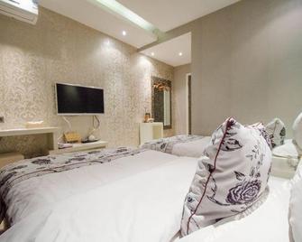 Yikezhan Boutique Hotel - Fuxin - Bedroom