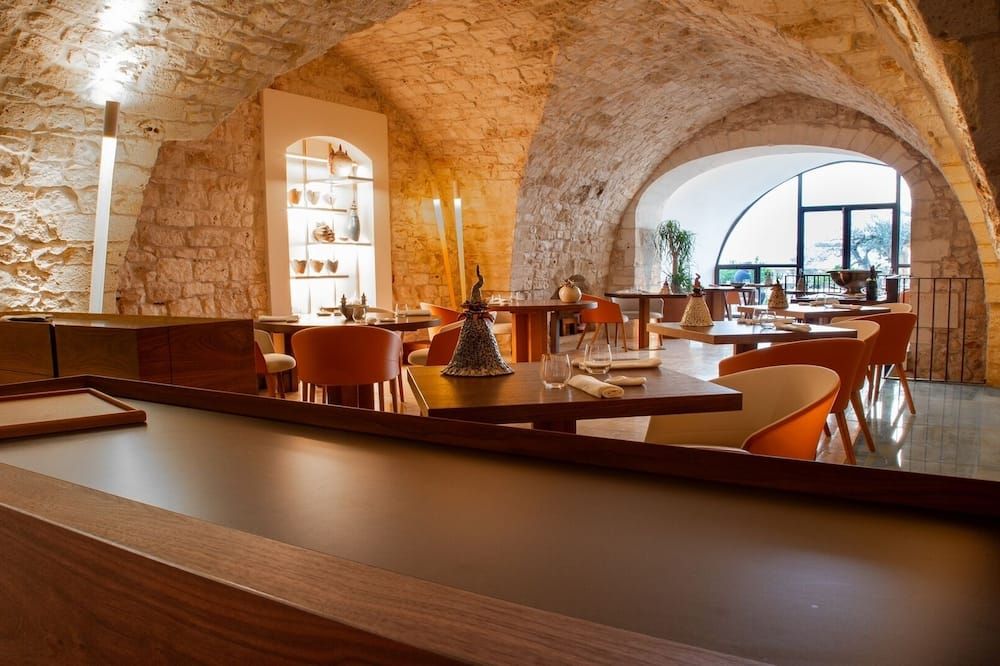 La Sommità Relais & Chateaux - אוסטוני - מסעדה