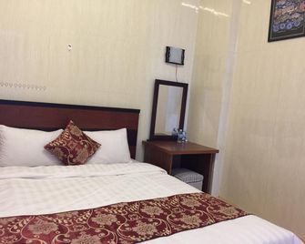 New Sleep in Dalat Hostel - Dalat - Bedroom