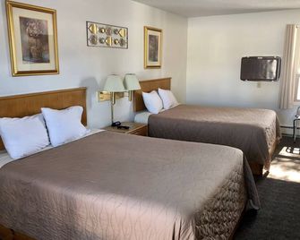 Budget Host Inn - Ironwood - Schlafzimmer