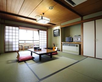Tabist Uguisuya Ryokan Obama Onsen - Unzen - Yemek odası