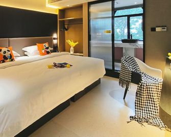Blue Sky Nayun Hotel (Liuzhou Ma'anshan Park Branch) - Liuzhou - Bedroom