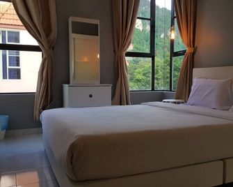 فندق توليب - إيبوه - غرفة نوم