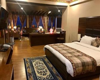 Hotel Norbu House - Dharamsala - Schlafzimmer