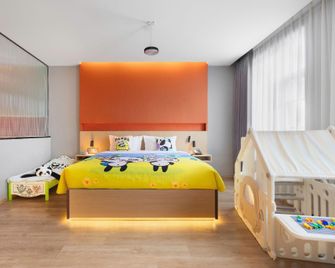 Jingdezhen Qinghui Nuanju Hotel (Taoxichuan Branch) - Jingdezhen - Schlafzimmer