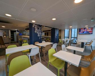 Ibis budget Clermont Ferrand le Brezet Aeroport - Clermont-Ferrand - Restaurant