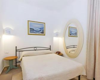 Palau City Hotel - Palau - Schlafzimmer