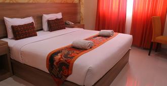 New d'Dhave Hotel - Padang - Habitación