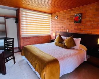 Hotel Villa Vianney - Paipa - Slaapkamer