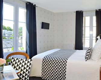 Hôtel du Manoir - טור - חדר שינה