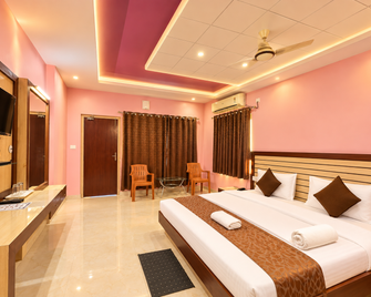 Hotel Swarna Villa puri - Puri - Slaapkamer