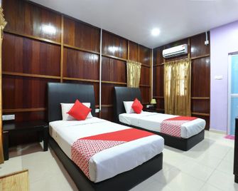 OYO 90038 Dalyla Inn Chalet - Chukai - Спальня