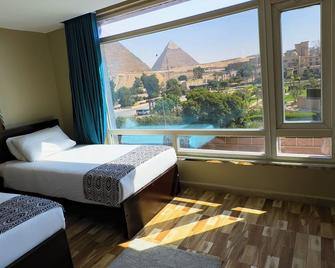 Turquoise Pyramids & Grand Egyptian museum view Hotel - El Cairo - Habitación