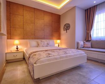 Sea Breeze Hotel and Apartments - Олуденіз - Спальня