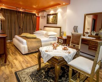 Hotel Boutique Vila Fernando Tirana - Tirana - Schlafzimmer
