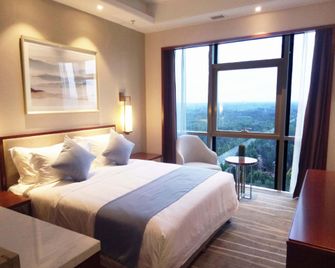 Fengdu Hotel - Dezhou - Bedroom