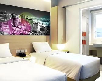 Cleo Hotel Jemursari Surabaya - Surabaya - Phòng ngủ