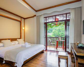 Yangshuo River View Hotel - גילין - חדר שינה
