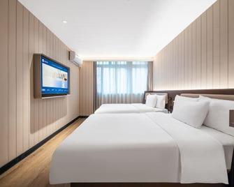 Hanting Hotel Chongqing Nanping Wanda Branch - Chongqing - Habitación