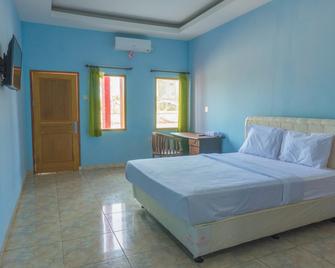 OYO 1525 Benson Hotel - Pangandaran - Slaapkamer