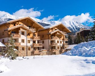 travelski home premium Résidence Le Hameau du Rocher Blanc 4 stars - Serre Chevalier - Bâtiment