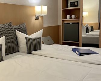 Hotel Garni Bettina - Гюнцбург - Спальня