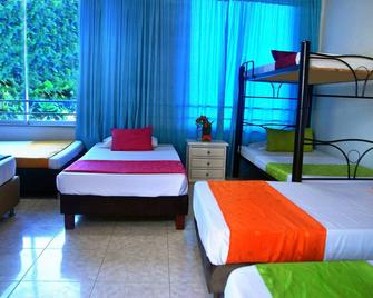 Ayenda Hotel Roisa - Girardot - Schlafzimmer
