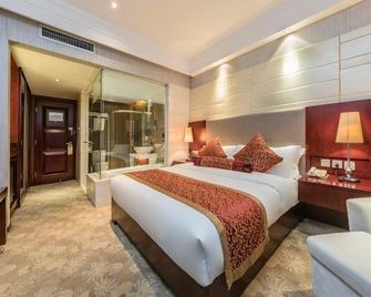 Min Jiang Hotel - פוז'ו - חדר שינה