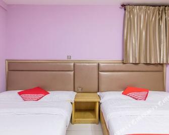 Huangsheng Hotel Quanzhou Minghu - Quanzhou - Slaapkamer