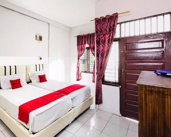 OYO 2069 Wisma Syariah Kampung Baru - Bandar - Habitación