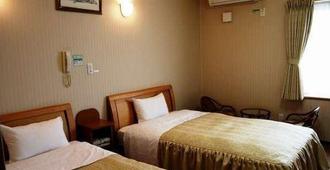 Business Hotel Grandy II - Obihiro - Camera da letto