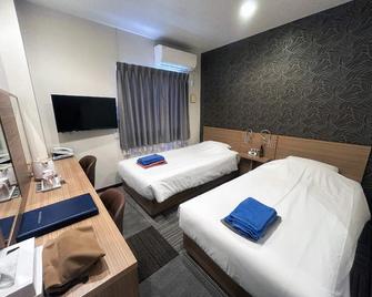 Business Hotel Goi Onsen - Ichihara - Slaapkamer